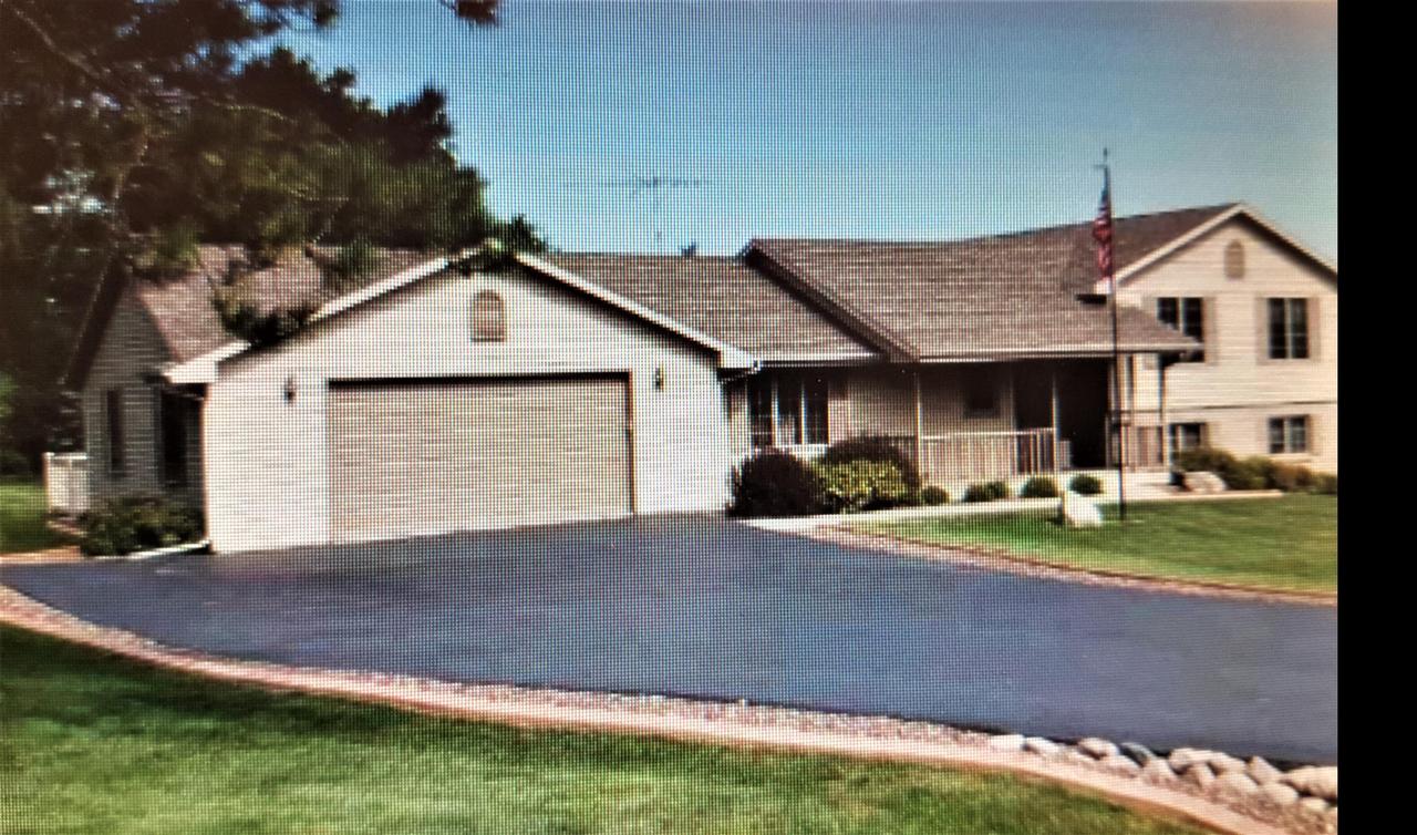 N6386 Woodridge Dr, Lafayette, WI 53121