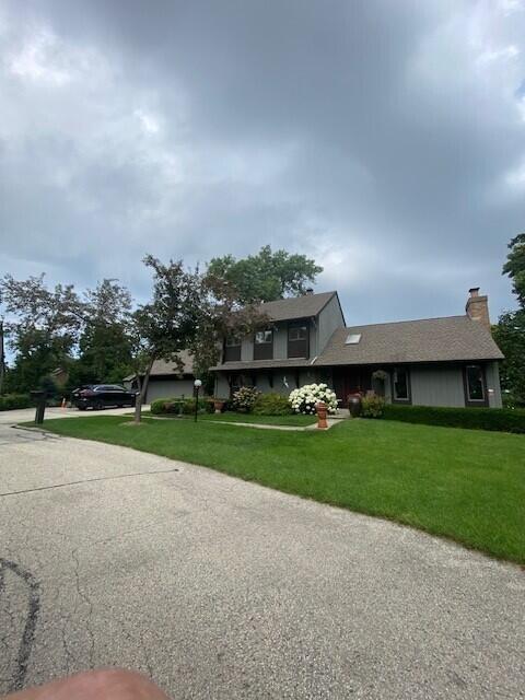 24 Lakewood Dr, Wind Point, WI 53402