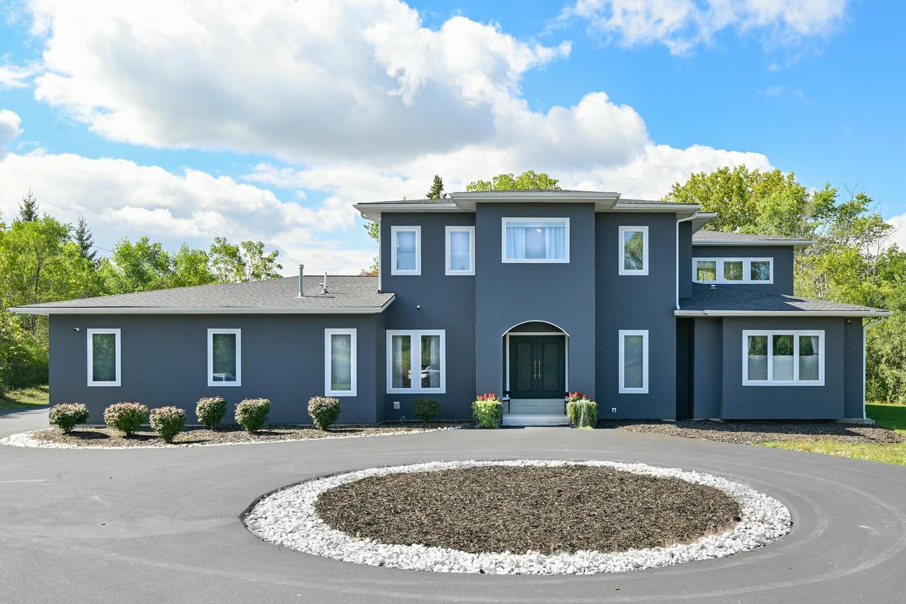 8825 N Spruce Rd, River Hills, WI 53217