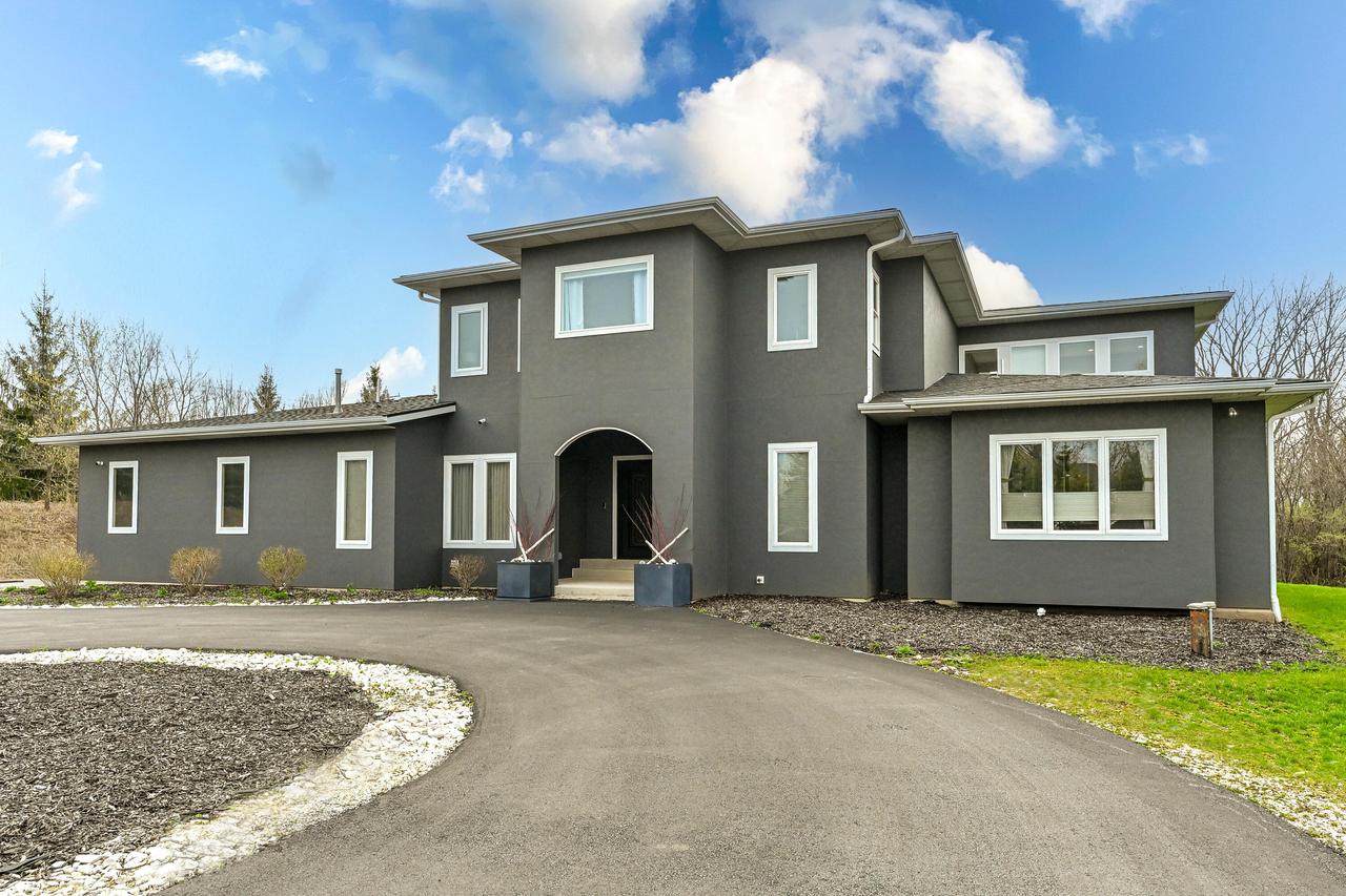 8825 N Spruce Rd, River Hills, WI 53217