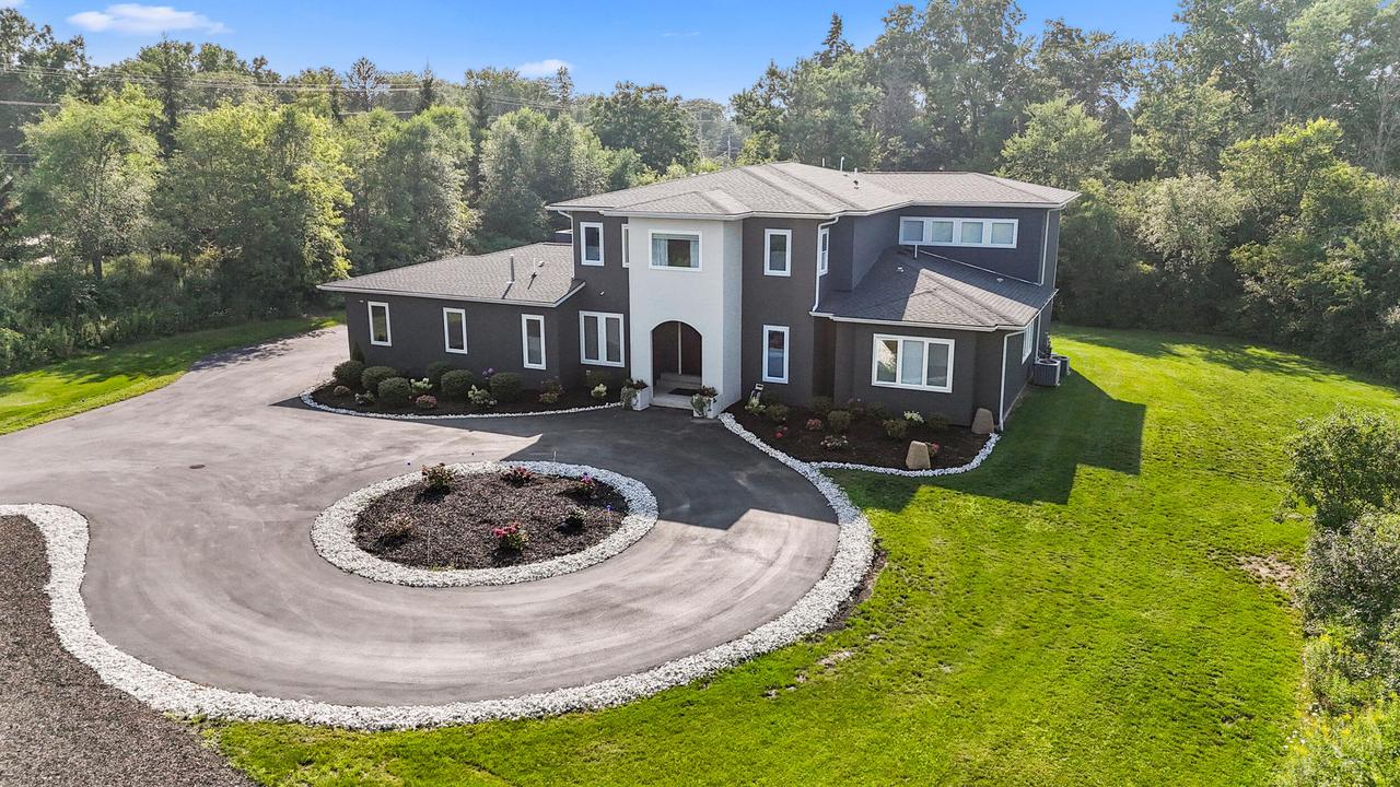 8825 N Spruce Rd, River Hills, WI 53217