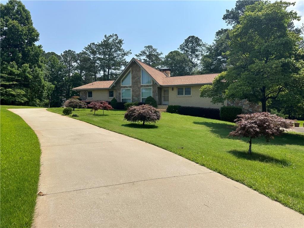 115 Cannongate Cir., Sharpsburg, GA 30277