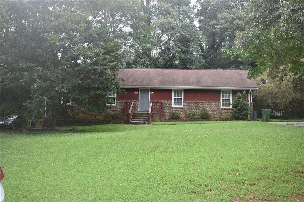 5566 NW Rock Garden Ct., Lilburn, GA 30047