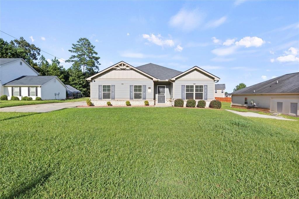 6968 New Dale Rd., Rex, GA 30273