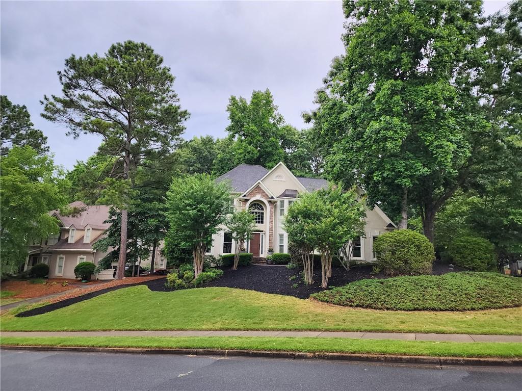 701 Whisper Wind Ct., Woodstock, GA 30189
