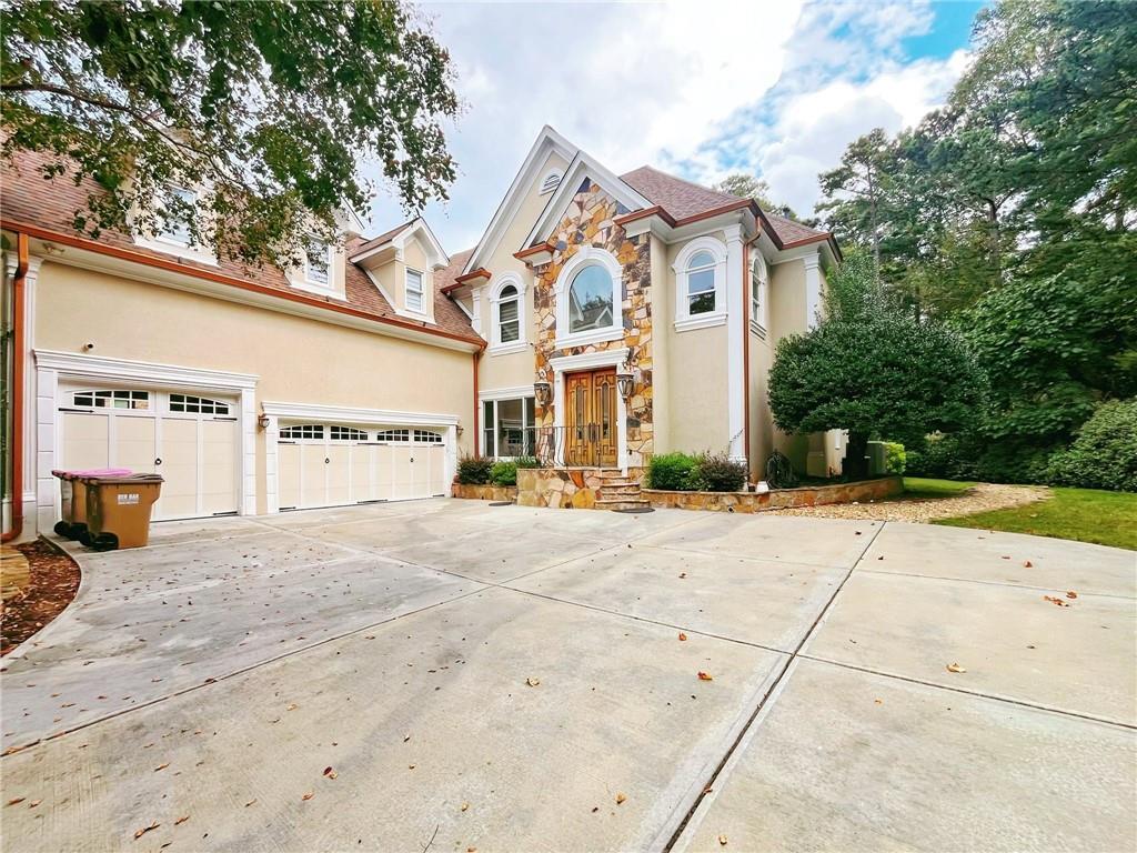 6709 Wooded Cove Ct., Flowery Branch, GA 30542