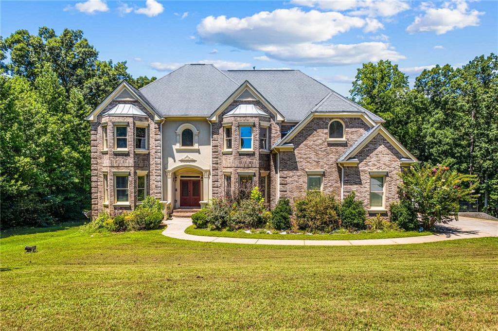 209 Kingscastle Dr., Ellenwood, GA 30294