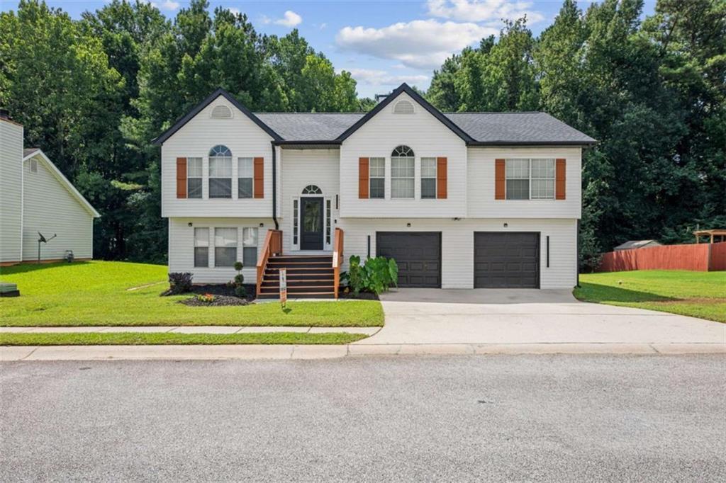 7153 New Dale Rd., Rex, GA 30273