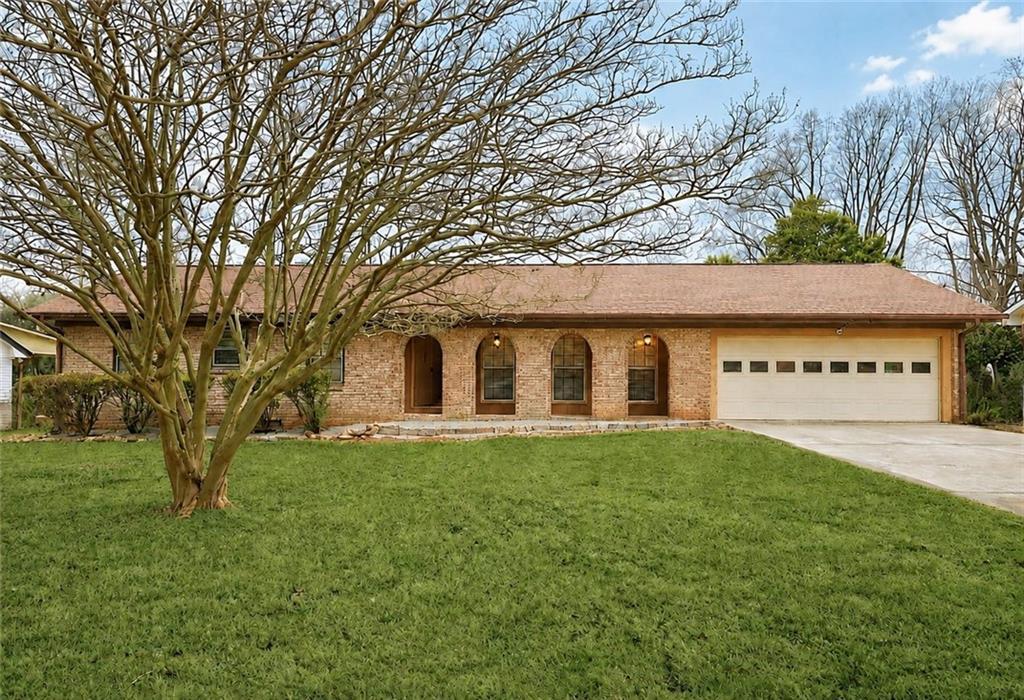 457 Castleaire Dr., Stone Mountain, GA 30087