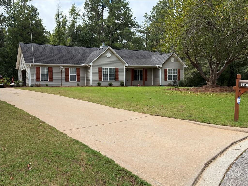 301 Wolf Creek Pl., Locust Grove, GA 30248