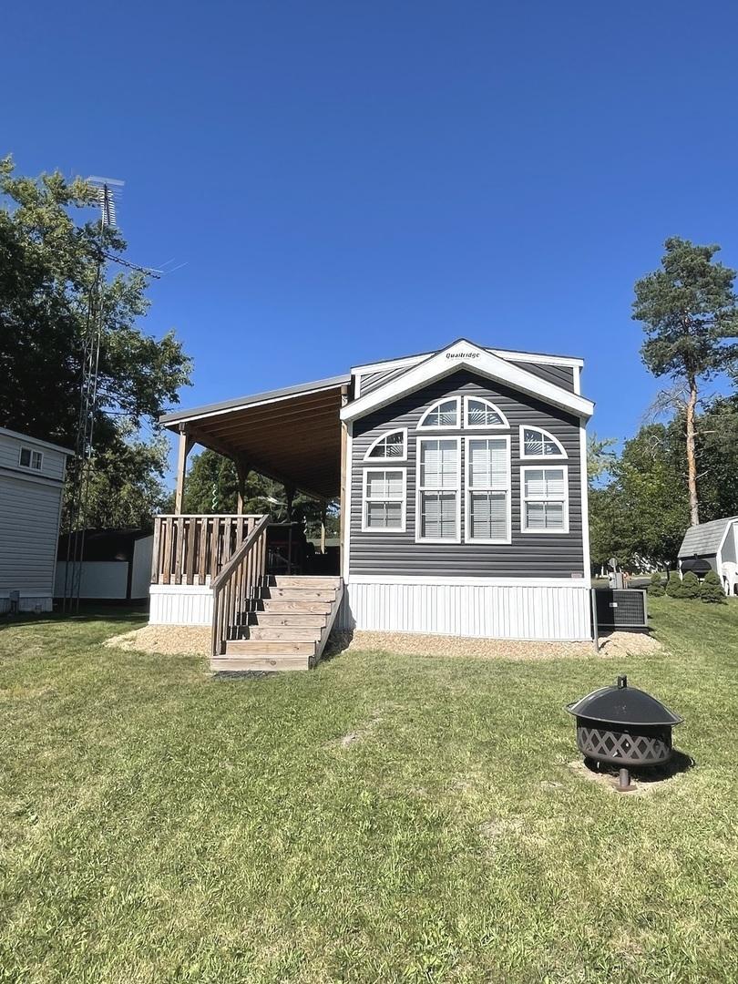 11-299 Woodhaven Lakes, Sublette, IL 61367