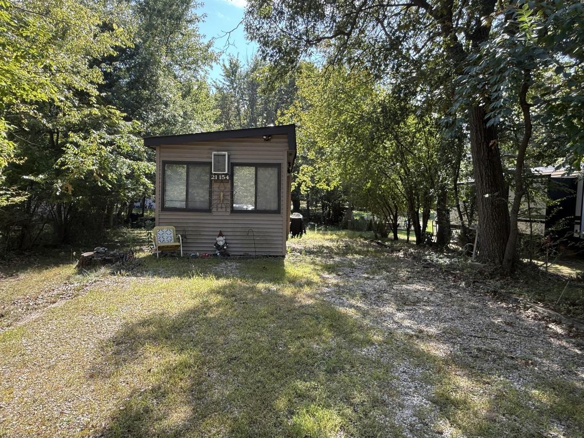 21-154 Woodhaven Lakes, Sublette, IL 61367