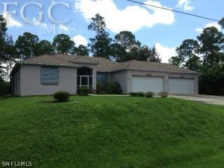 414 Truman Ave., Lehigh Acres, FL 33972