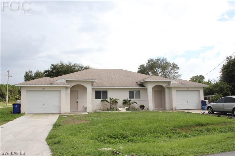 305 Lillon Ave., Lehigh Acres, FL 33974