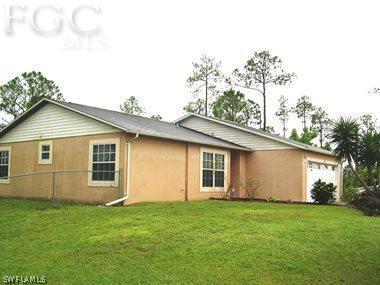 1006 Mcarthur Ave., Lehigh Acres, FL 33936