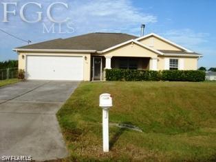 703 Wanda Ave., Lehigh Acres, FL 33971