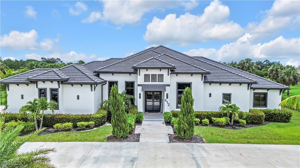 612 Poinsettia Ave., Lehigh Acres, FL 33972