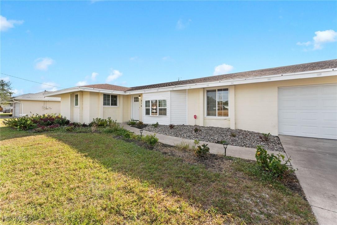 314 Inman St., Lehigh Acres, FL 33936