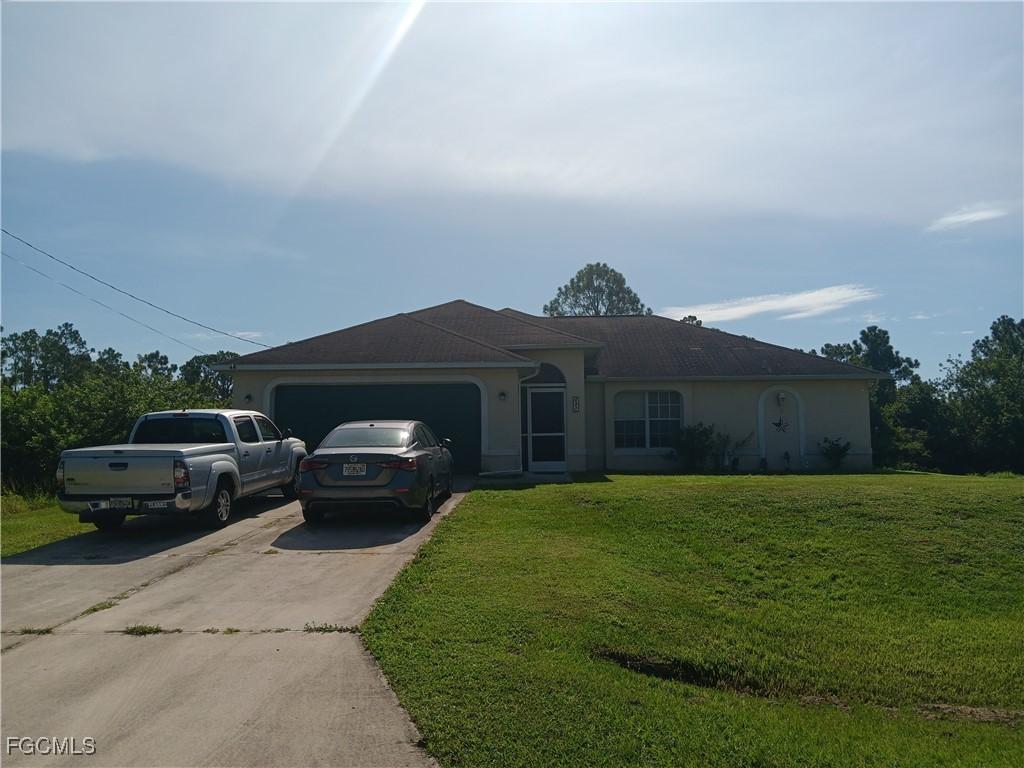 631 Aspen Ave., Lehigh Acres, FL 33974