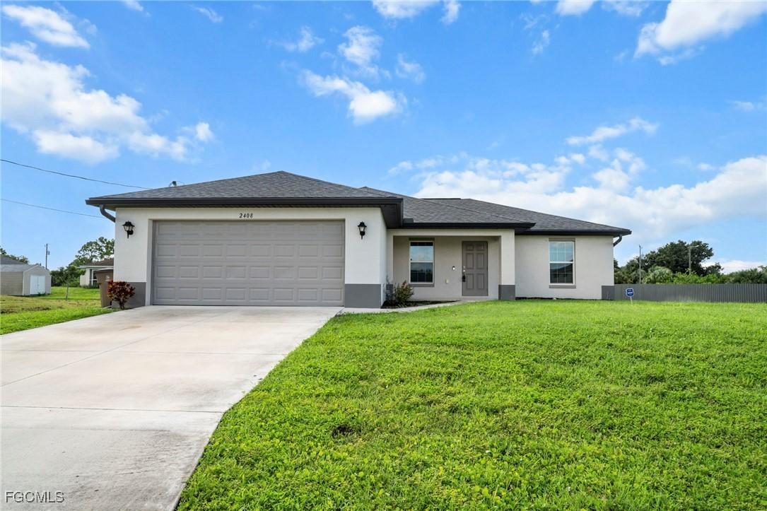 2408 Carvell Ave., Lehigh Acres, FL 33971