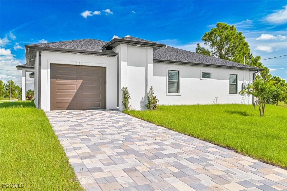 585/587 Alabama Rd., Lehigh Acres, FL 33974