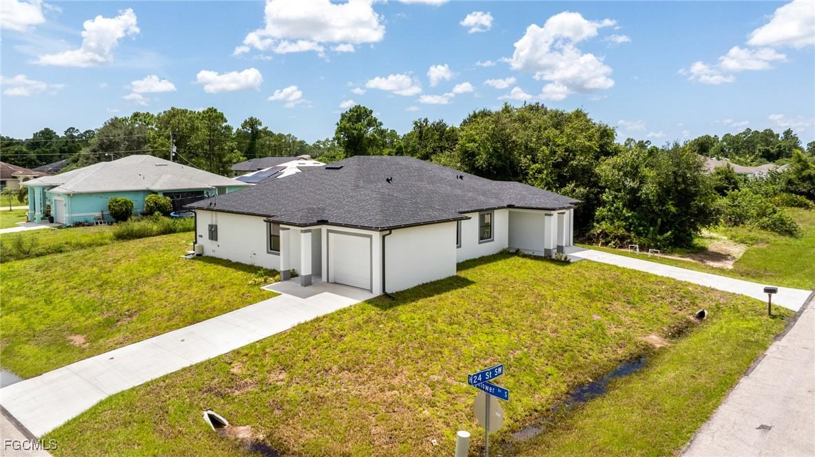 2406 Hightower Ave., Lehigh Acres, FL 33973