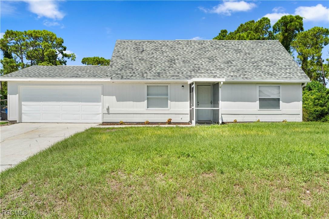 205 James Ave., Lehigh Acres, FL 33971