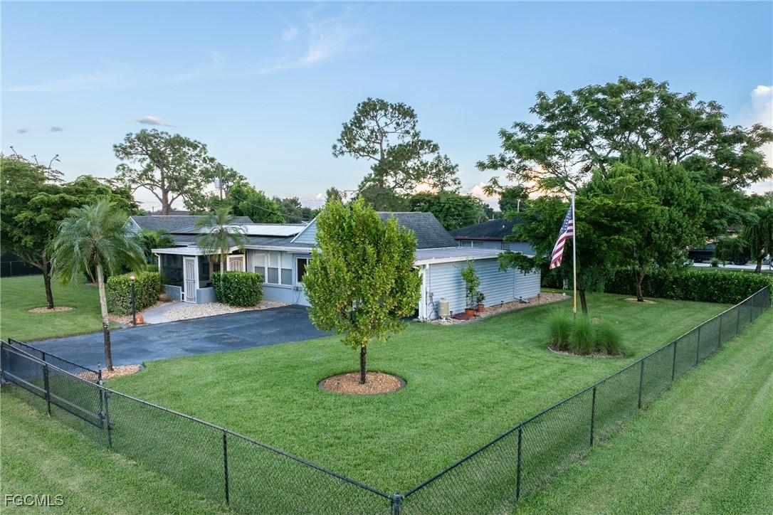 402 E Cleveland Ln., Lehigh Acres, FL 33936