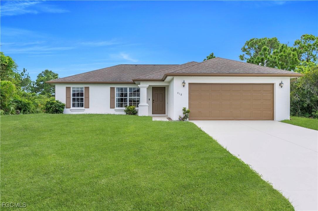 418 Palmyra Ave., Lehigh Acres, FL 33974