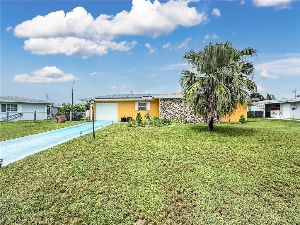 218 Fireside Ct., Lehigh Acres, FL 33936