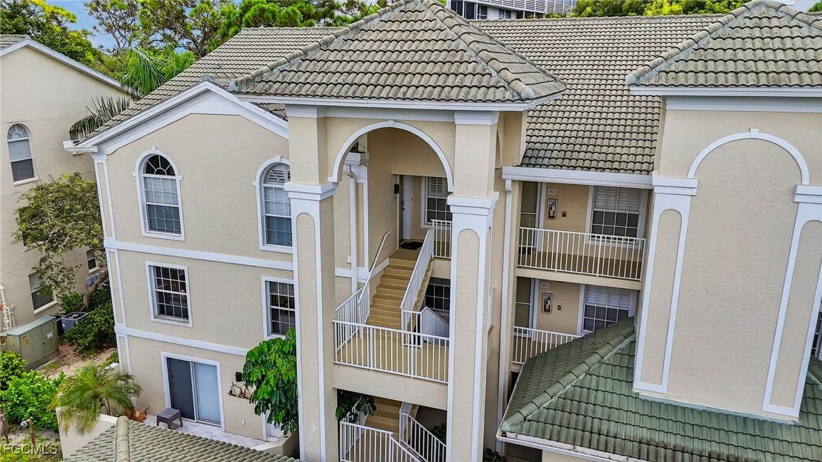 15405 Cedarwood Ln. #201, Naples, FL 34110