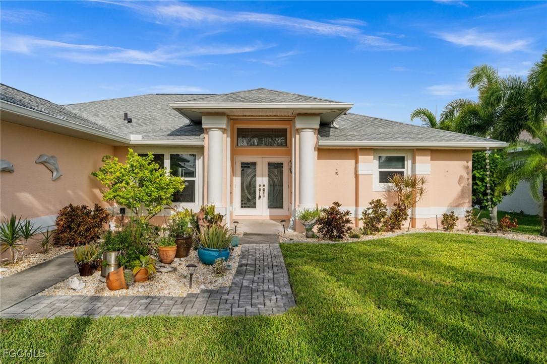 907 NW 38th Pl., Cape Coral, FL 33993