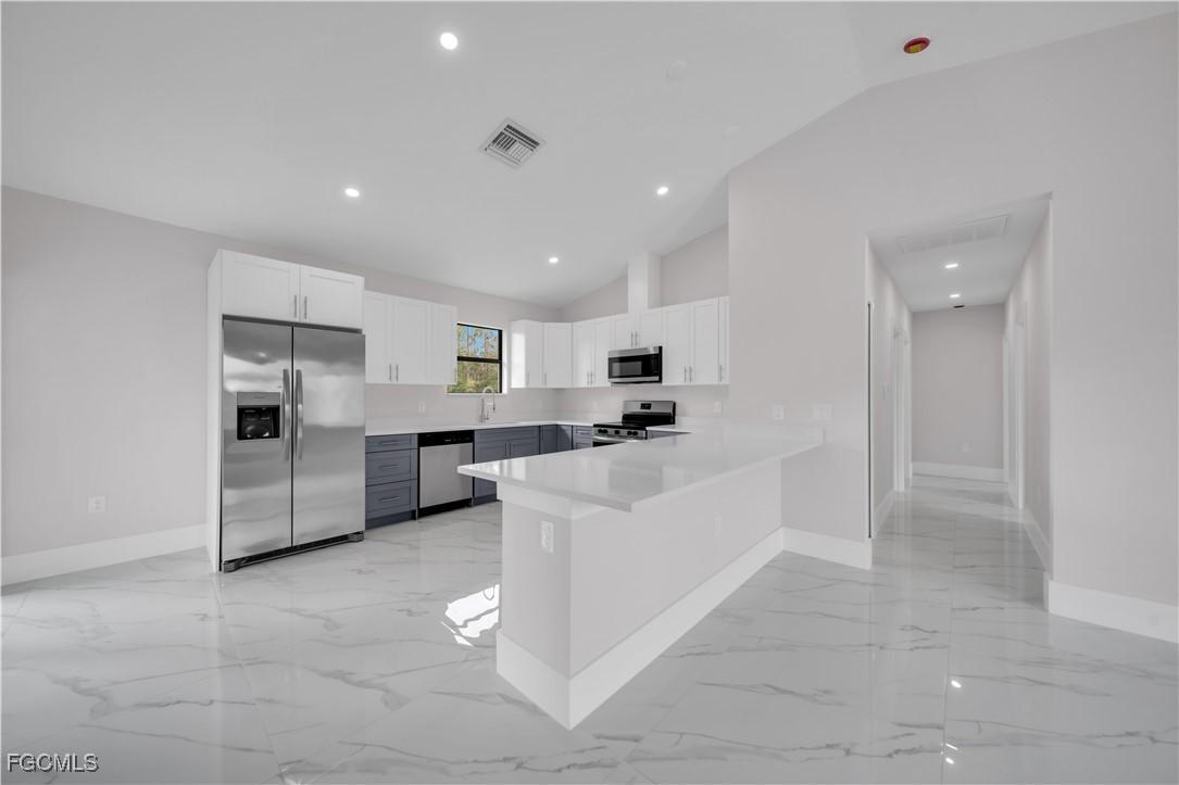 457 Woodman Dr., Lehigh Acres, FL 33972