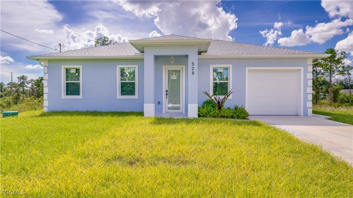 528 Aspen Ave., Lehigh Acres, FL 33974