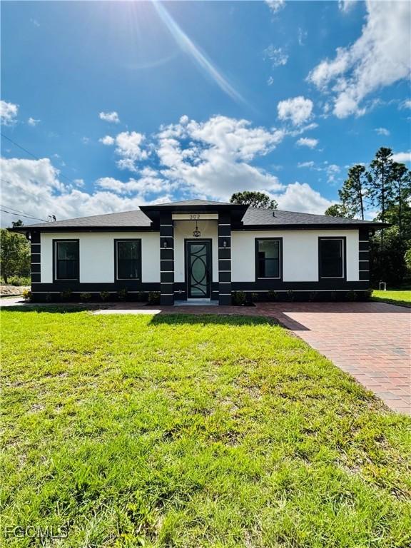 302 E 15th St., Lehigh Acres, FL 33972