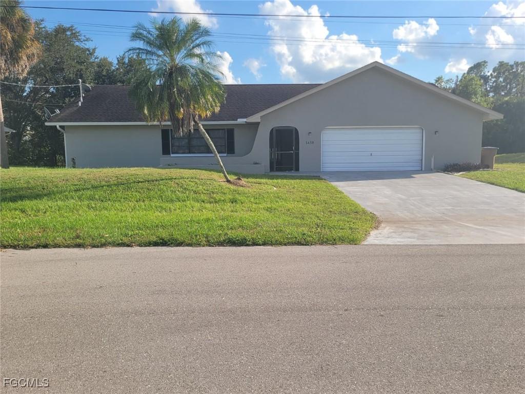 1438 Graham Cir., Lehigh Acres, FL 33936