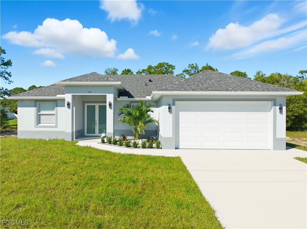 518 Harry Thayer Ave., Lehigh Acres, FL 33974