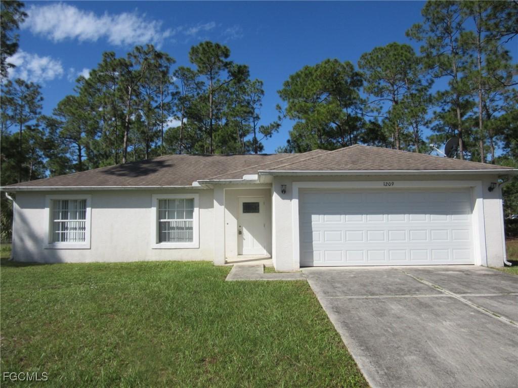 1209 Lake Ave., Lehigh Acres, FL 33972