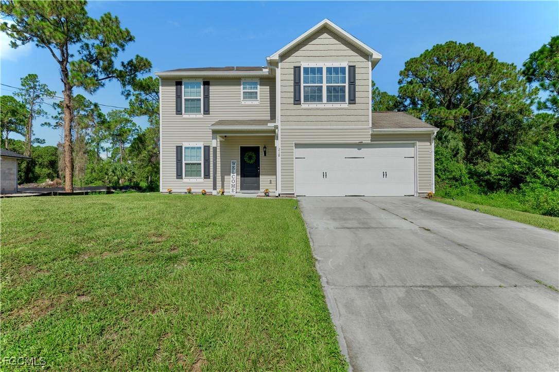218 Lomax Ave., Lehigh Acres, FL 33974