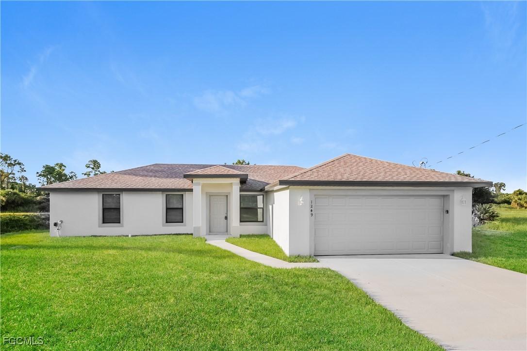 1249 Cordoba St., Lehigh Acres, FL 33974
