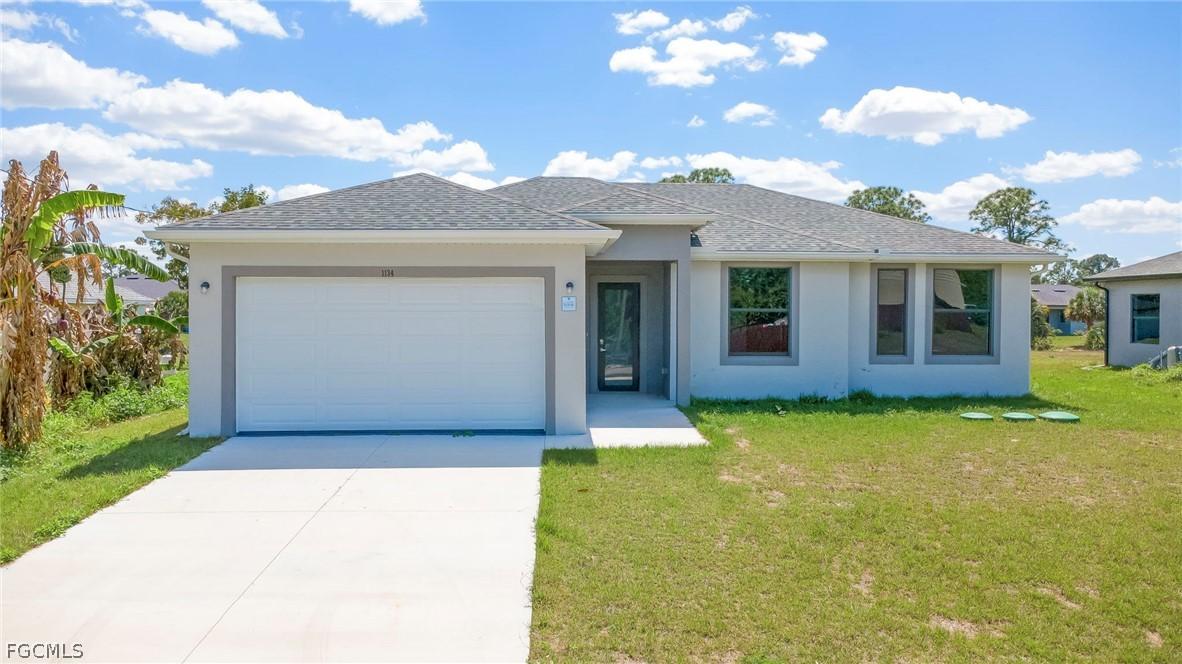 1134 Cumming St., Lehigh Acres, FL 33974