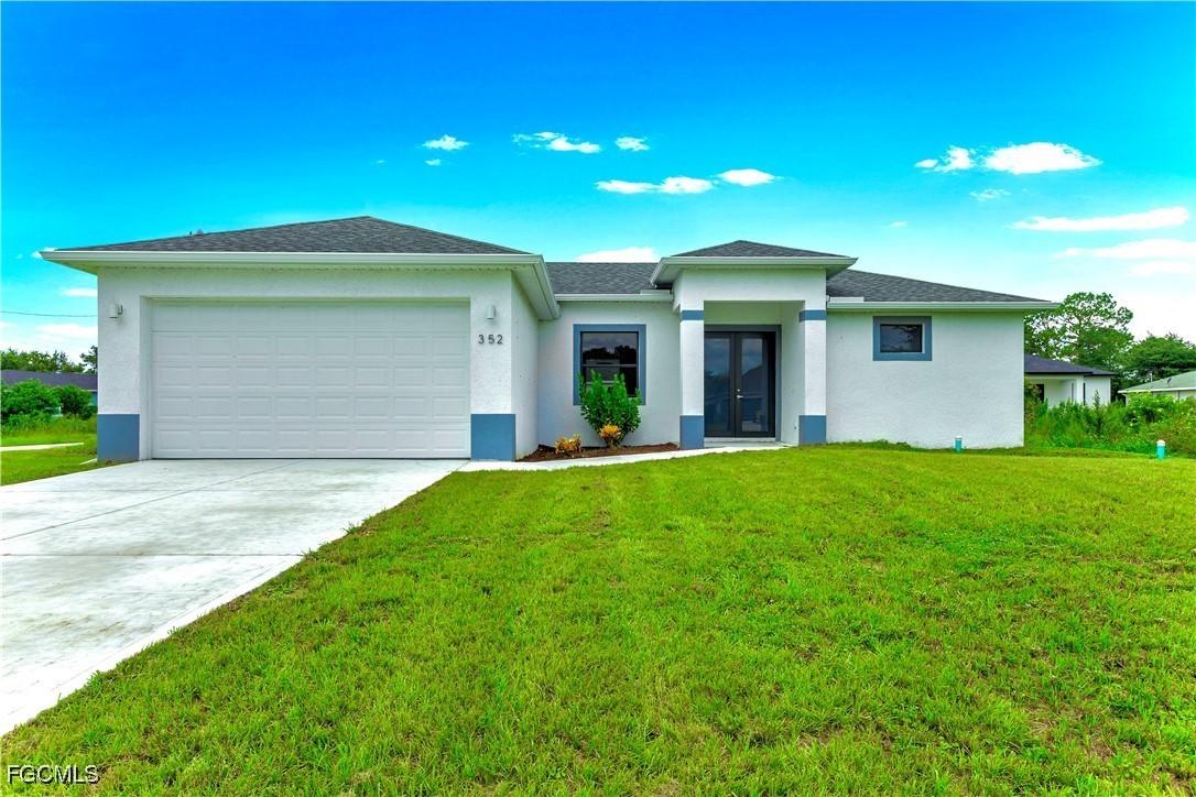 352 Rawlings Ave., Lehigh Acres, FL 33974