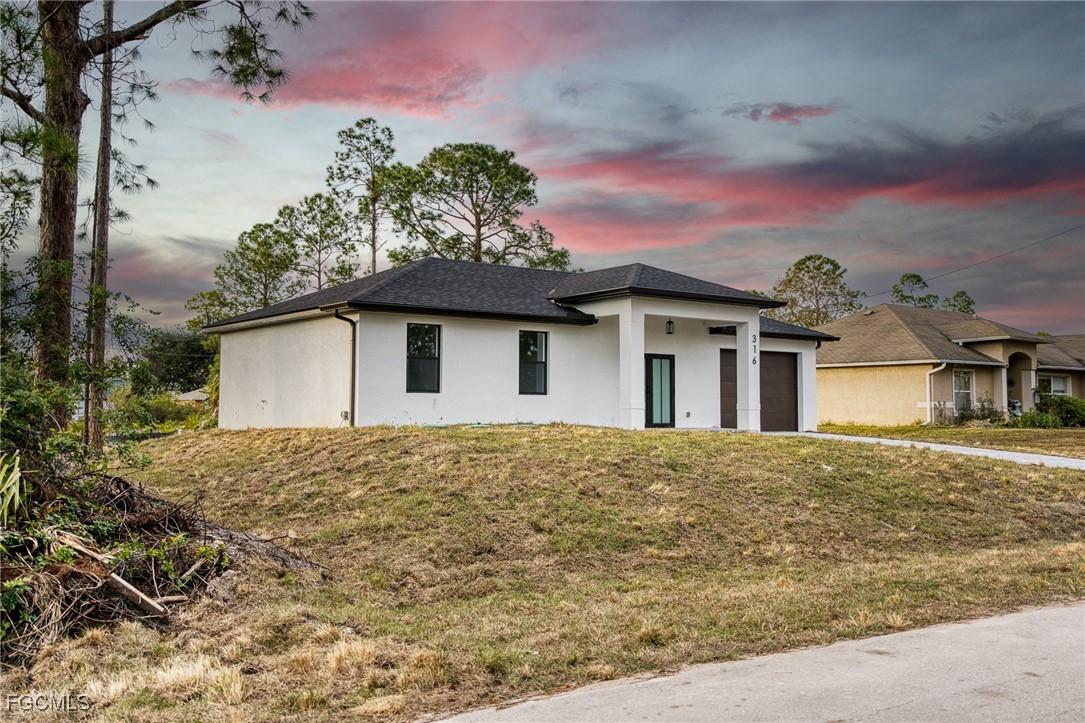 316 Mangonia Ave., Lehigh Acres, FL 33974