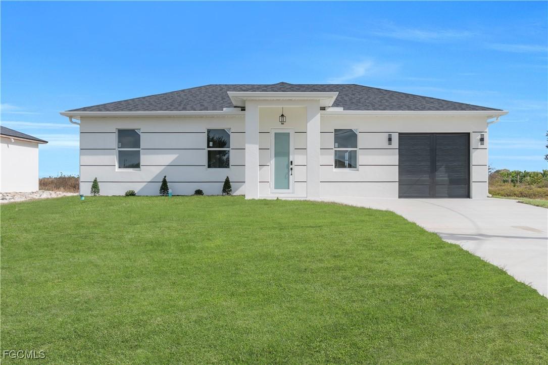 337 Rawlings Ave., Lehigh Acres, FL 33974