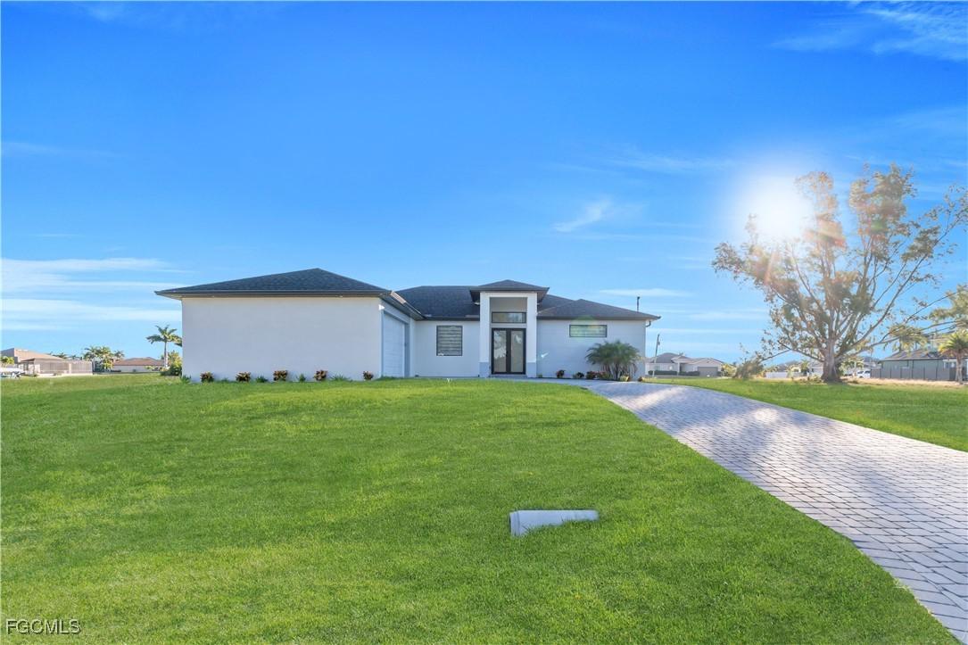 911 NW 37th Pl., Cape Coral, FL 33993