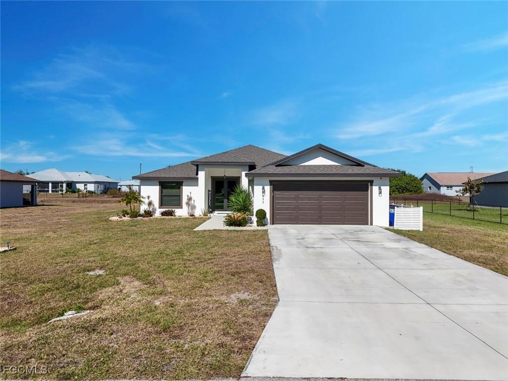 633 Carrillon Ave., Lehigh Acres, FL 33974