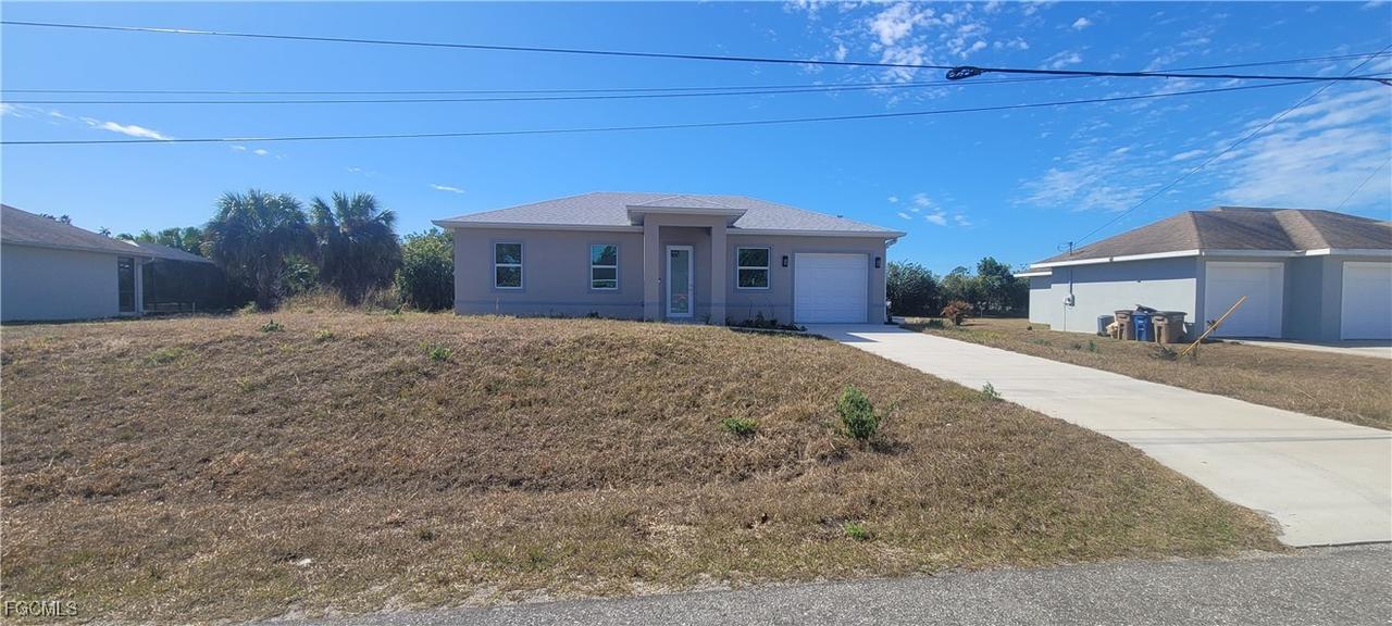 402 Harrison Dr., Lehigh Acres, FL 33936