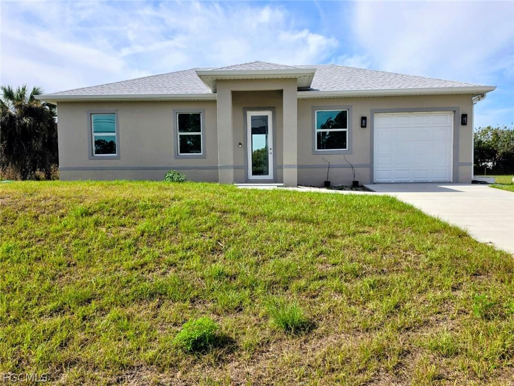 402 Harrison Dr., Lehigh Acres, FL 33936