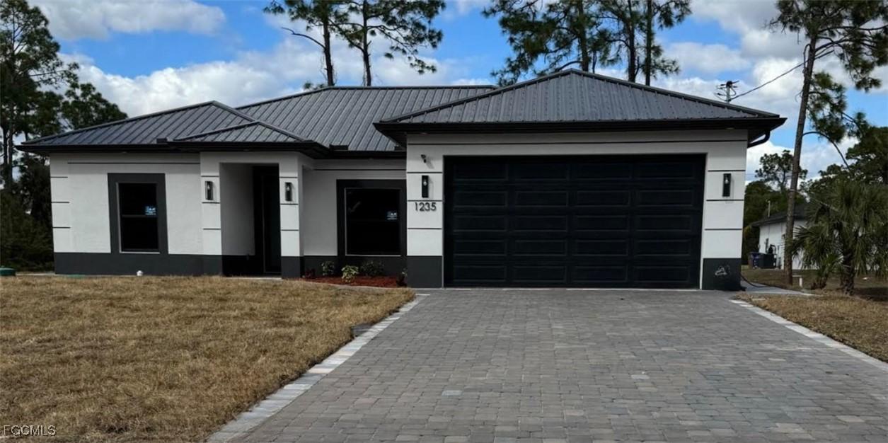 1235 Count St E St., Lehigh Acres, FL 33974