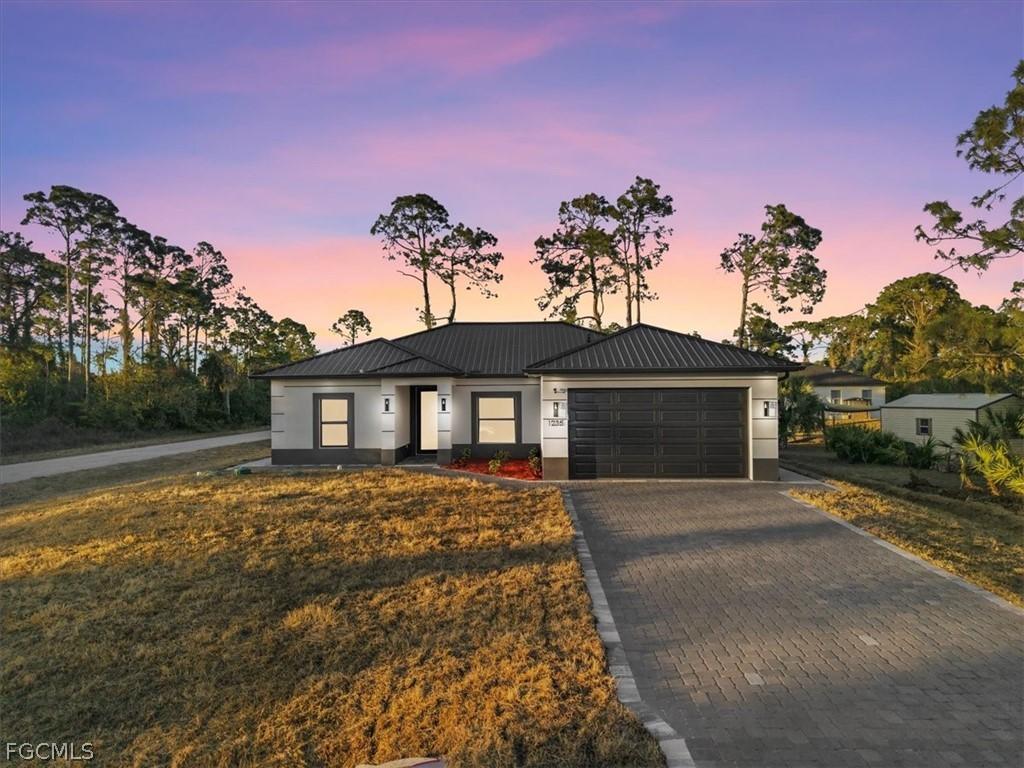 1235 Count St E St., Lehigh Acres, FL 33974